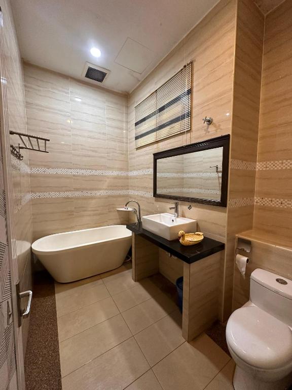 Koupelna v ubytování Maxwell Inn Luxury Hotel