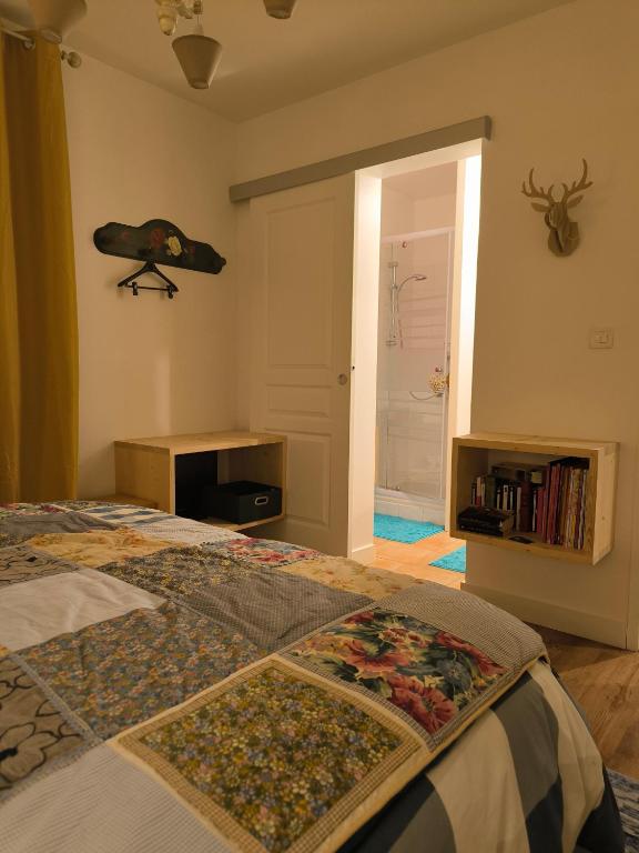 Postel nebo postele na pokoji v ubytování La Frênaie