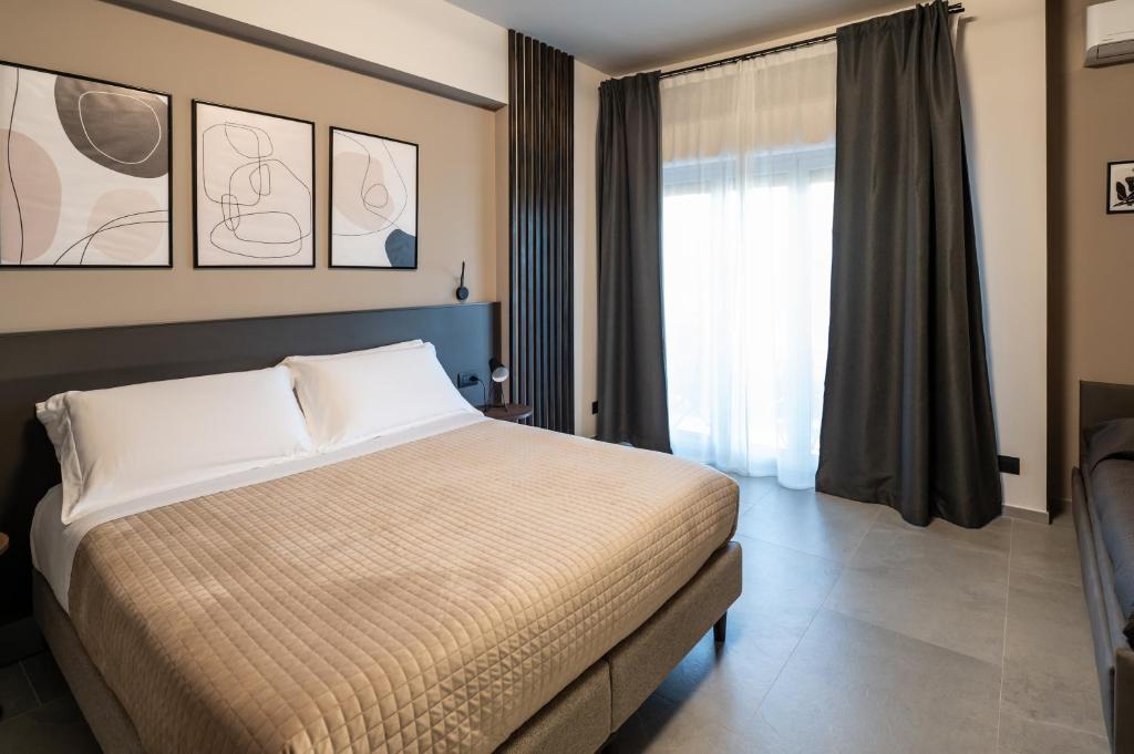 Katil atau katil-katil dalam bilik di MIA Rooms B&B