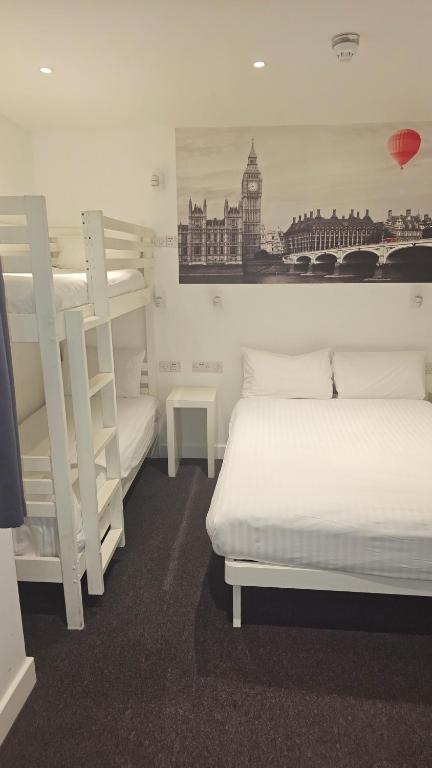 Letto o letti in una camera di Hotel Meridiana
