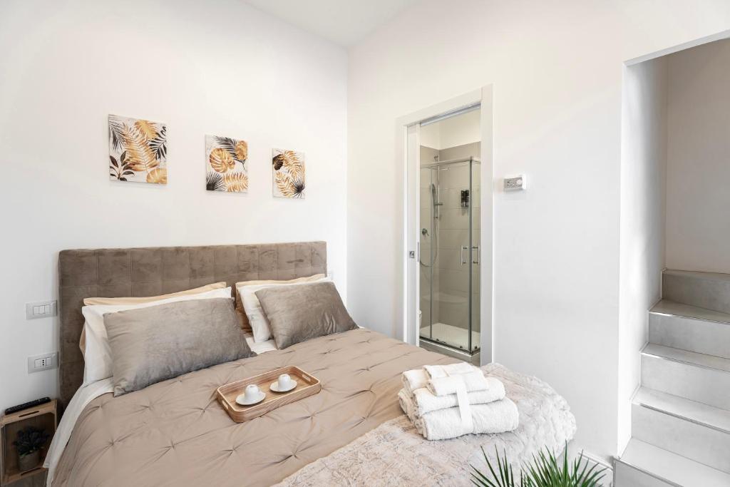 Postel nebo postele na pokoji v ubytování Luxury - Jacuzzi Apartments Near Rome