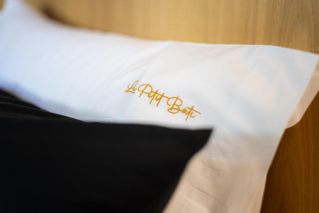 Postel nebo postele na pokoji v ubytování Scandinavian - Le petit Bati