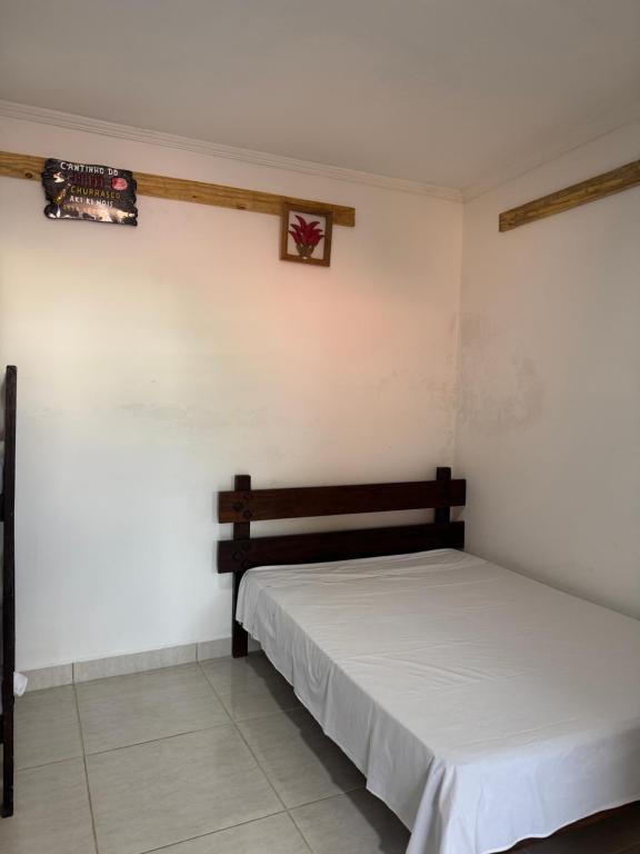 Uma cama ou camas num quarto em Flats Bem Te Vi - Praia Grande