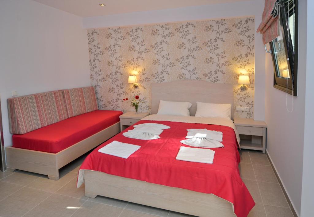 Postel nebo postele na pokoji v ubytování Hotel Akti