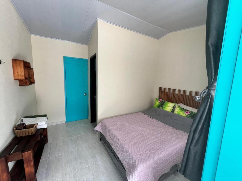 Postel nebo postele na pokoji v ubytování Posada Lili