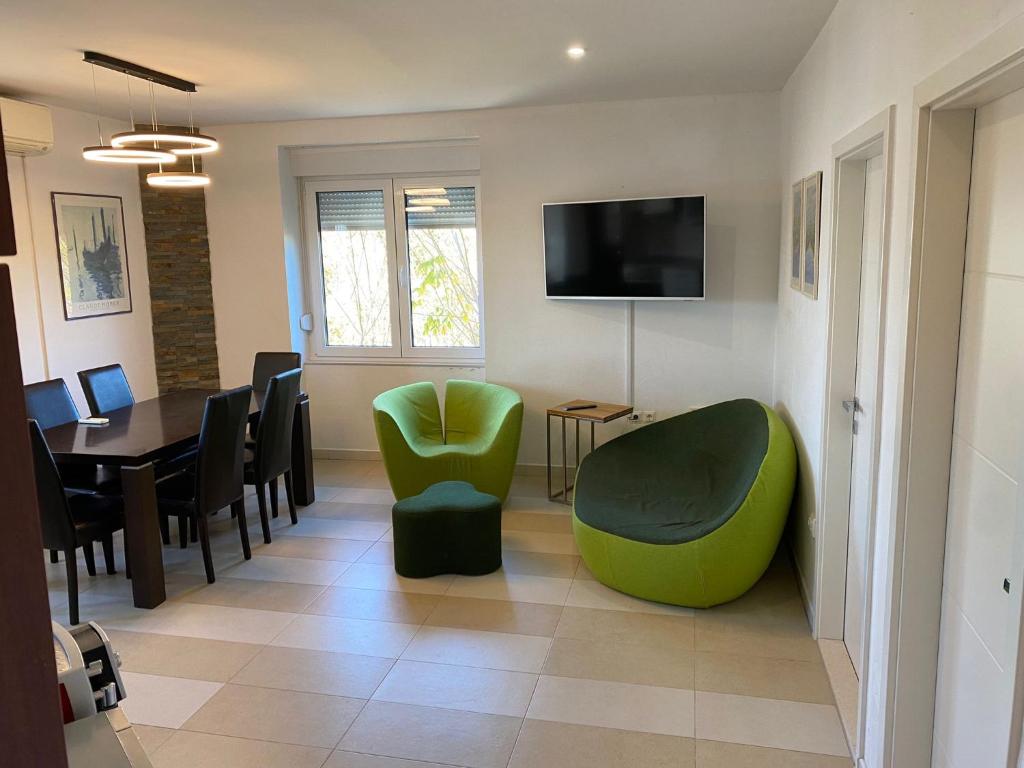 TV a/nebo společenská místnost v ubytování Ferienwohnung Zadar-City