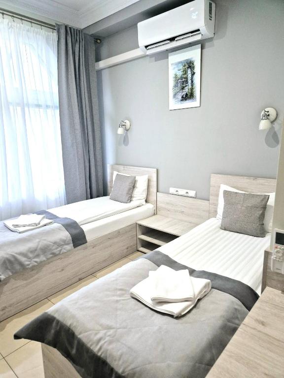 Postel nebo postele na pokoji v ubytování Zajazd Fakir