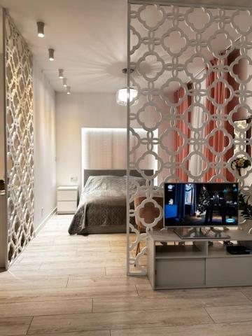 Posteľ alebo postele v izbe v ubytovaní Flat4You V