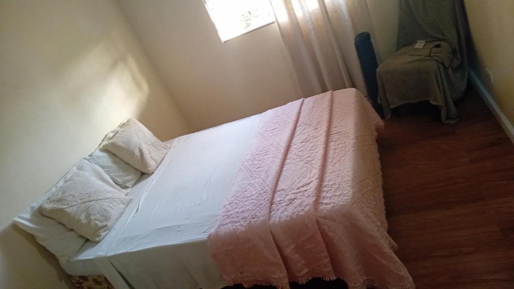 Postel nebo postele na pokoji v ubytování Chandler Homestay