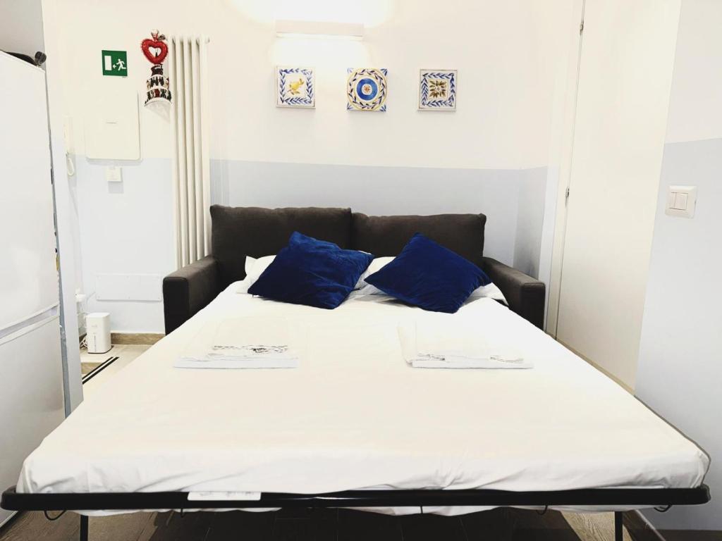 Postel nebo postele na pokoji v ubytování Scala Santa Home