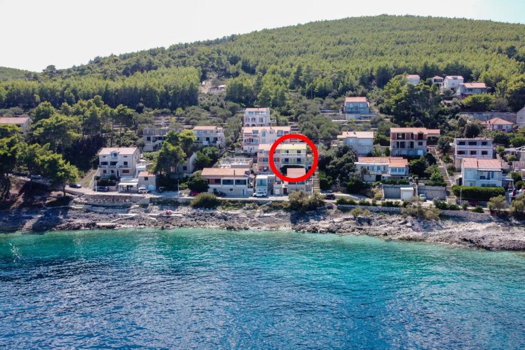 an aerial view of a small town next to the water at Apartments by the sea Prigradica, Korcula - 544 in Blato