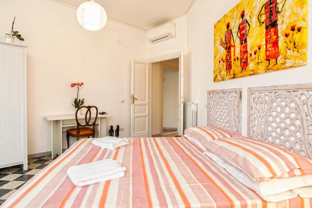 Postelja oz. postelje v sobi nastanitve Vatica B&B Roma