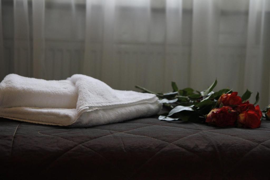 Posteľ alebo postele v izbe v ubytovaní HotelsLublin