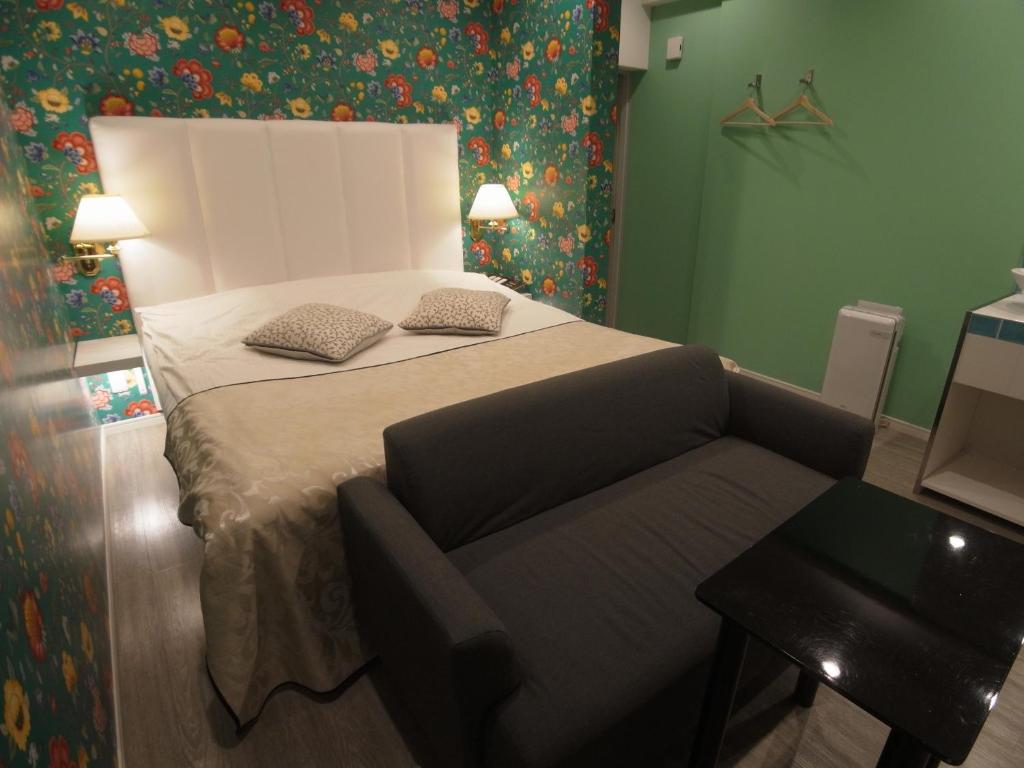 Postel nebo postele na pokoji v ubytování ホテルラパンセ Adult Only