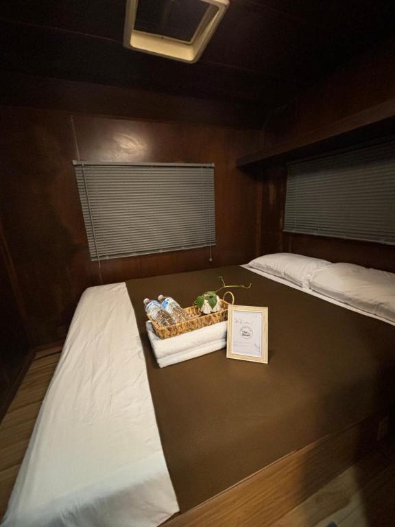 Postel nebo postele na pokoji v ubytování Momotoh Camper