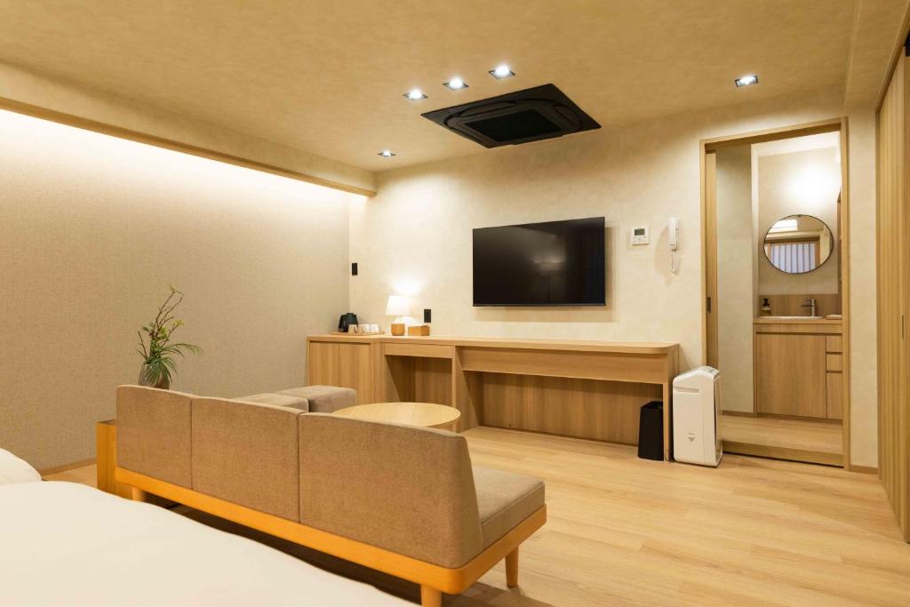 TV a/nebo společenská místnost v ubytování Hotel Paul House