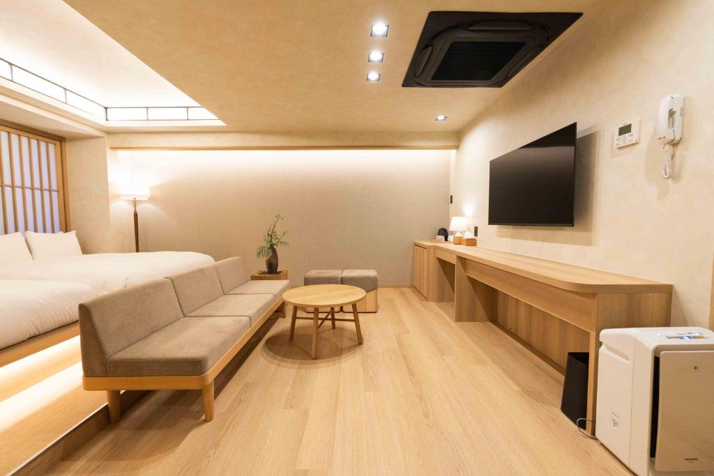 TV a/nebo společenská místnost v ubytování Hotel Paul House
