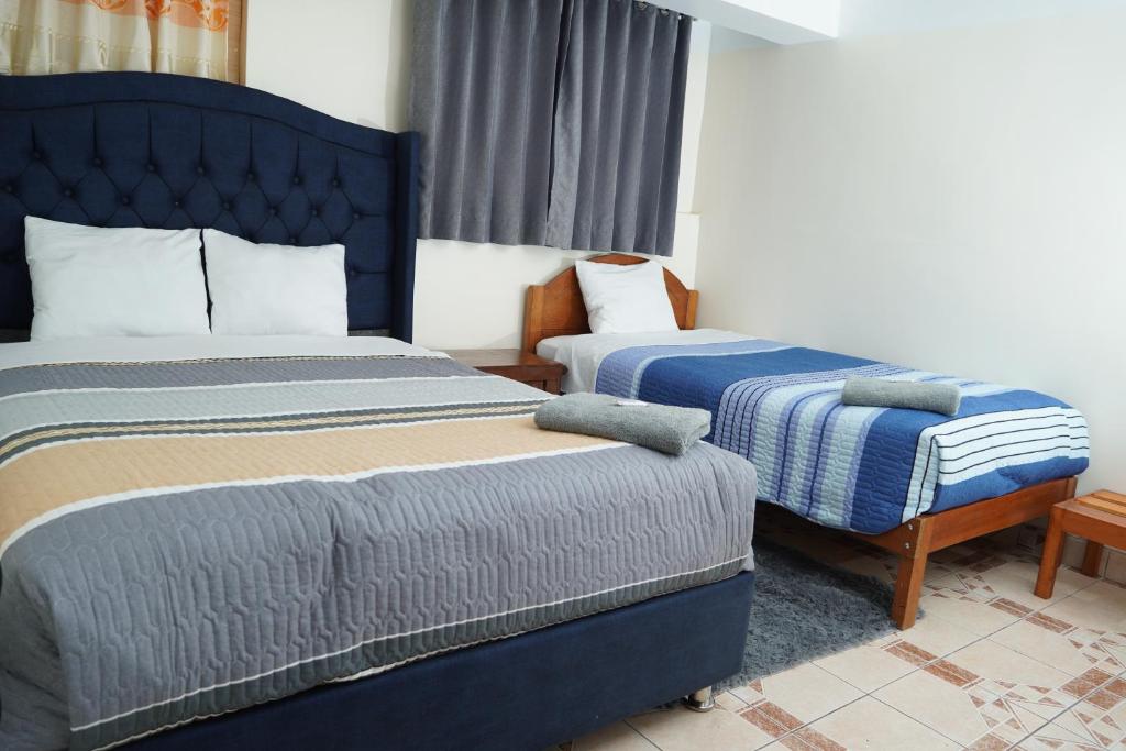 Voodi või voodid majutusasutuse Conquistador Hotel toas