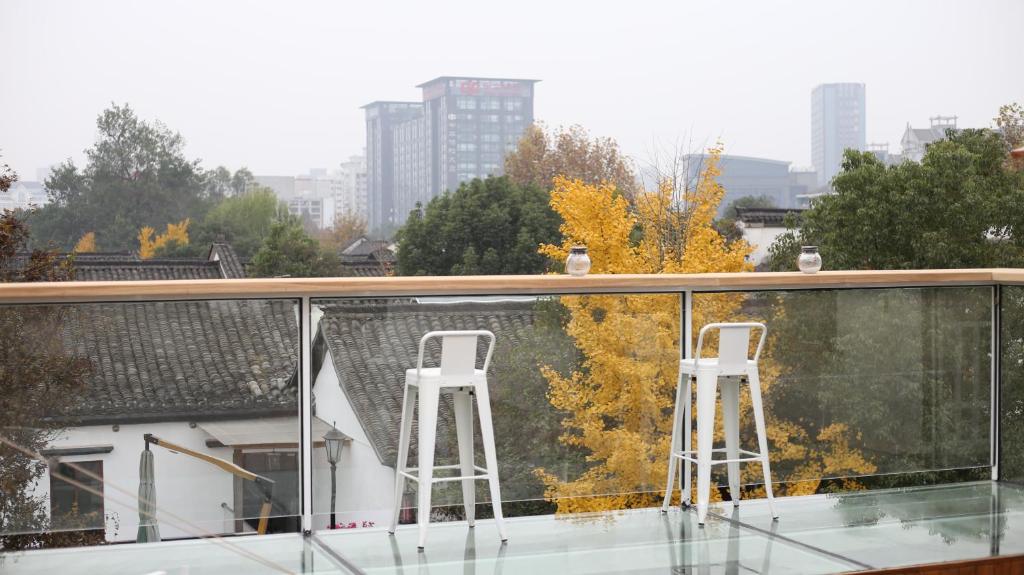 Balkón nebo terasa v ubytování Youxiake Canal Hotel Hangzhou
