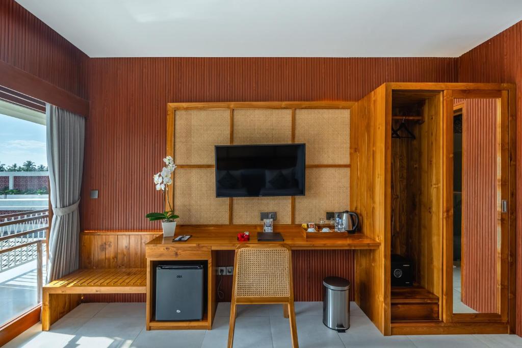 TV a/nebo společenská místnost v ubytování Puri Andong Villa