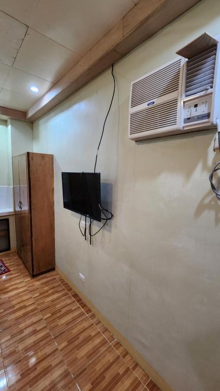TV a/nebo společenská místnost v ubytování Screaming Gecko Hostel