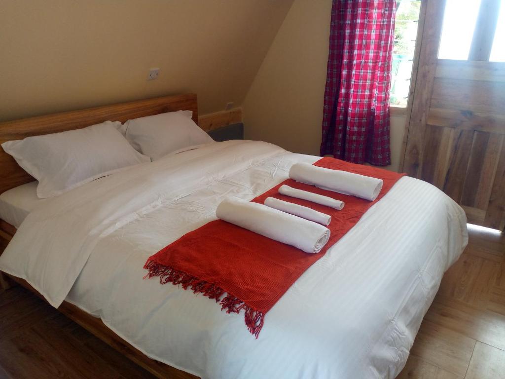 Postel nebo postele na pokoji v ubytování Riverine Cabins