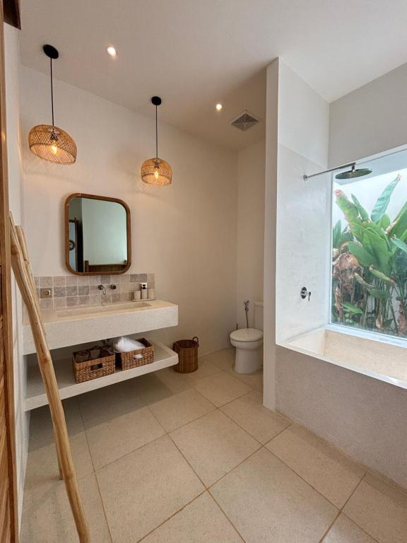 Koupelna v ubytování Bandeja Villa, your charming place in Nyan Nyang