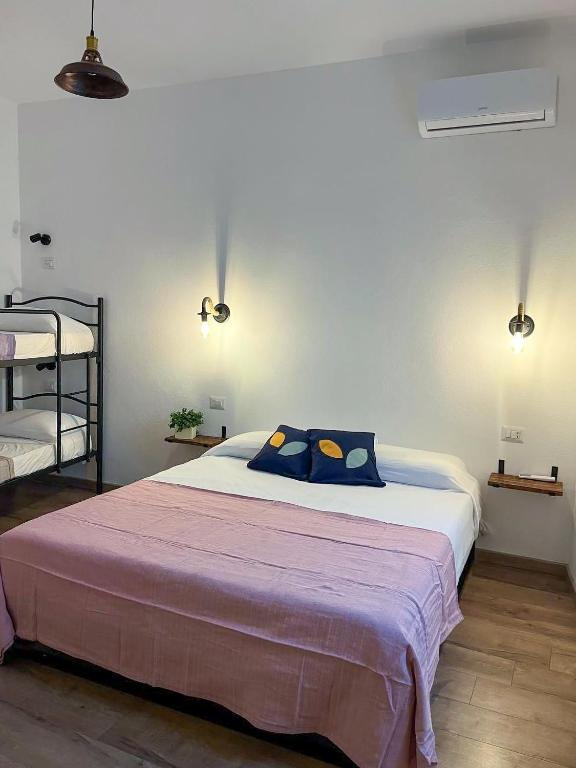 Postel nebo postele na pokoji v ubytování Trilli EcoBnB