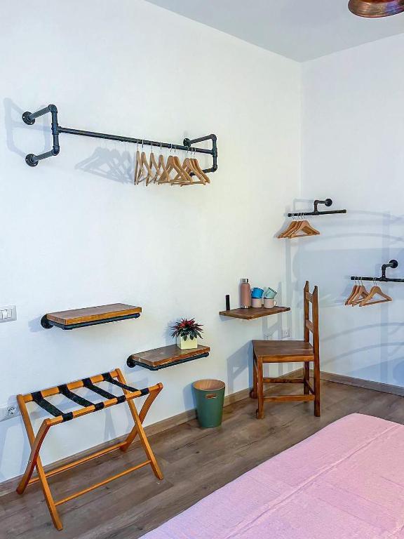 Postel nebo postele na pokoji v ubytování Trilli EcoBnB