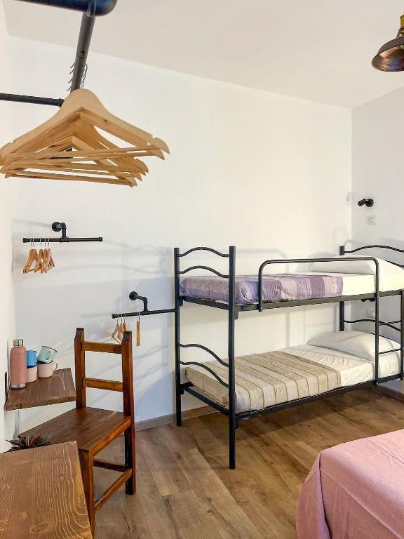 Postel nebo postele na pokoji v ubytování Trilli EcoBnB