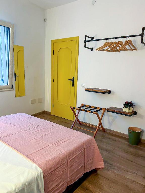 Postel nebo postele na pokoji v ubytování Trilli EcoBnB