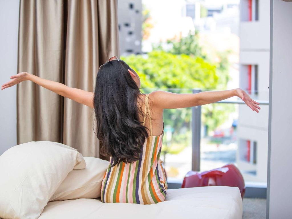 Postel nebo postele na pokoji v ubytování ibis Styles Singapore Albert