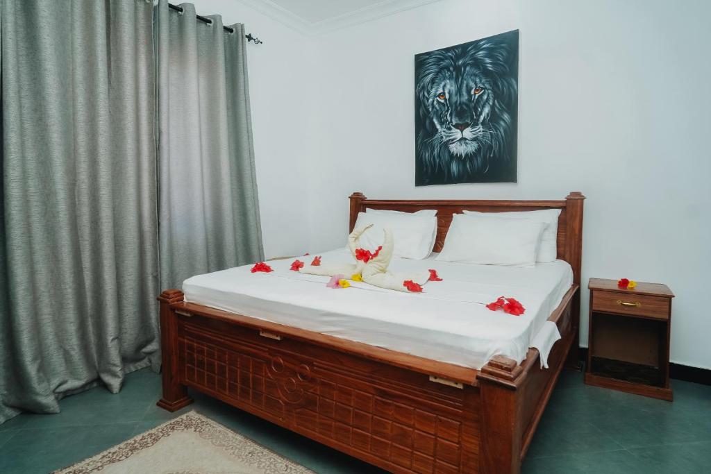 Postel nebo postele na pokoji v ubytování Tamu House Pajé Beach