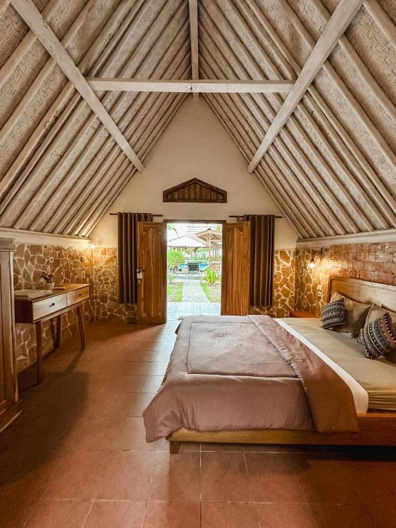 Una cama o camas en una habitación de Sedjiwa