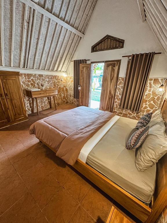 Una cama o camas en una habitación de Sedjiwa