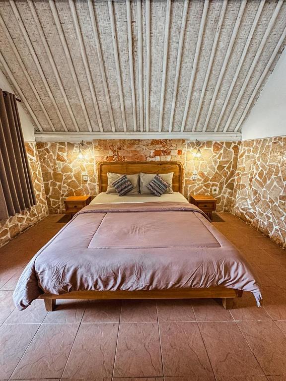 Una cama o camas en una habitación de Sedjiwa
