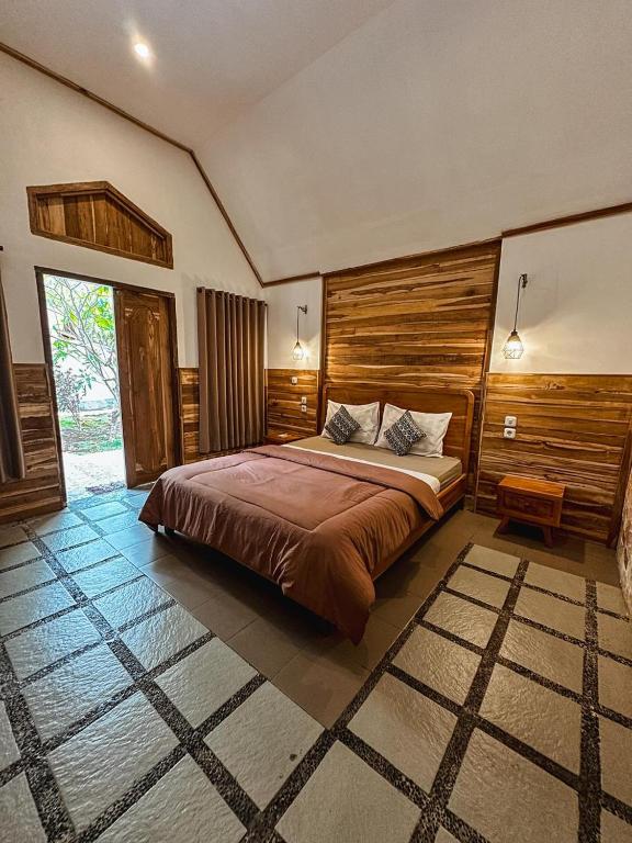 Una cama o camas en una habitación de Sedjiwa