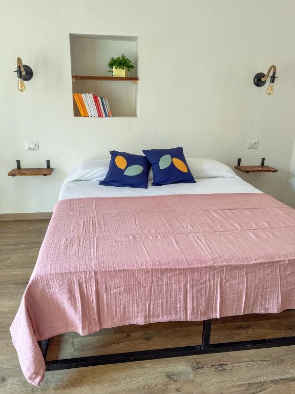 Postel nebo postele na pokoji v ubytování Trilli EcoBnB