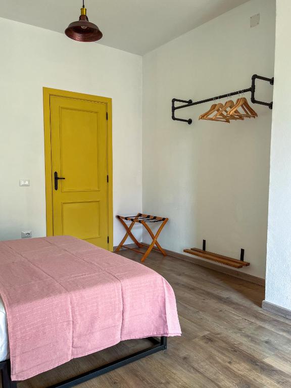 Postel nebo postele na pokoji v ubytování Trilli EcoBnB