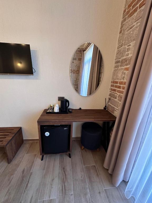 TV a/nebo společenská místnost v ubytování Cunda Nisa Otel