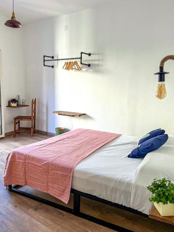 Postel nebo postele na pokoji v ubytování Trilli EcoBnB