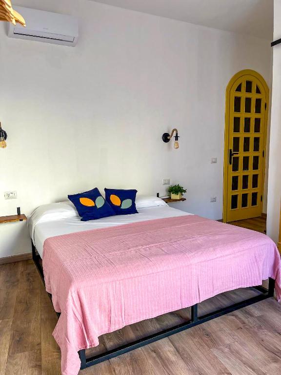 Postel nebo postele na pokoji v ubytování Trilli EcoBnB