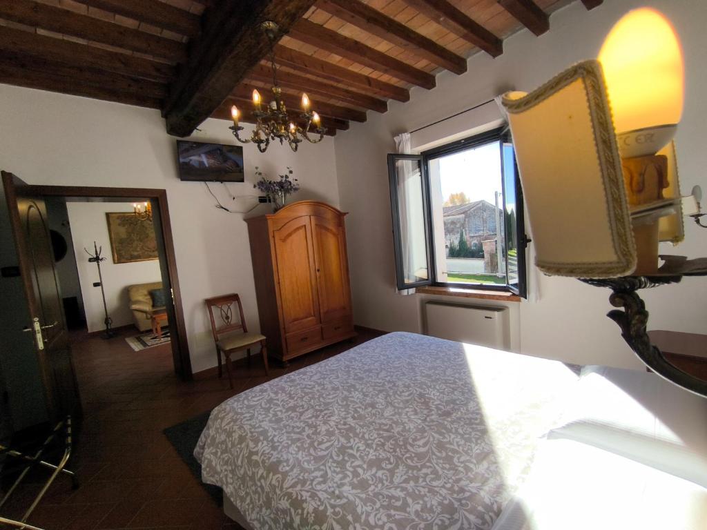 Letto o letti in una camera di Volivia Relais