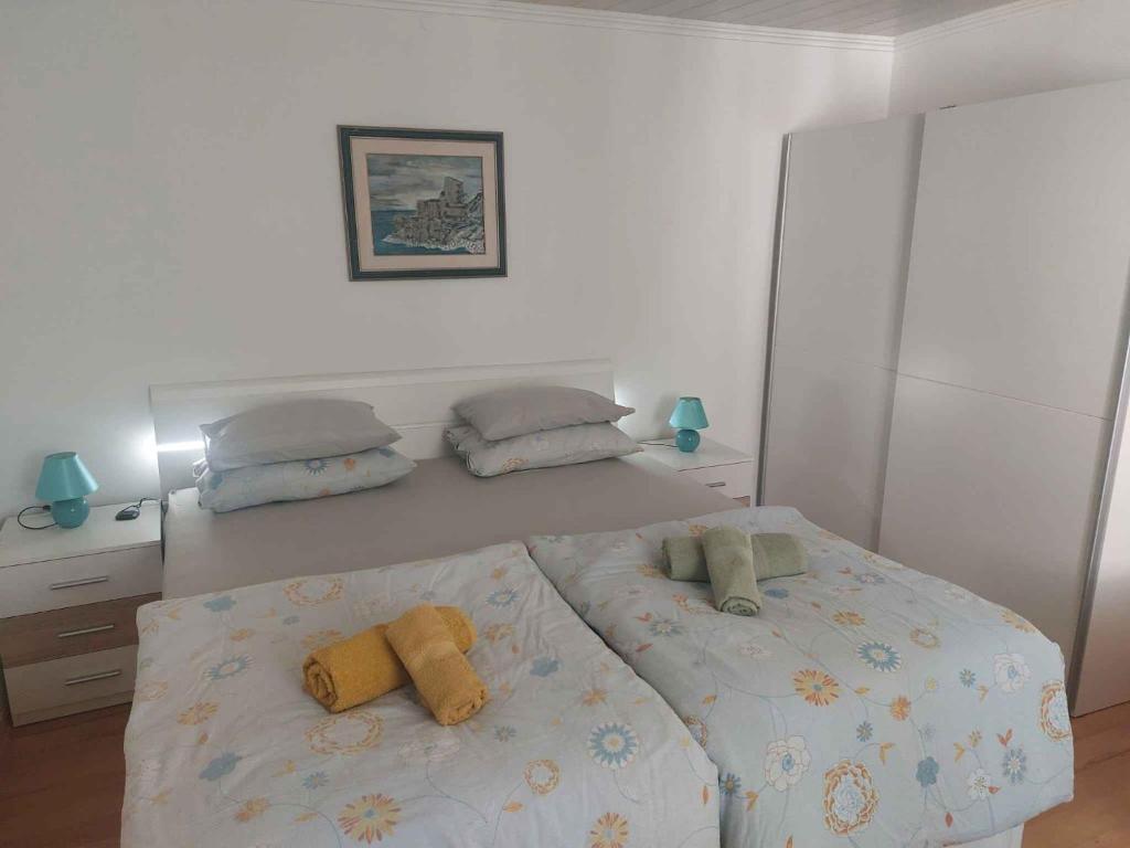 Postel nebo postele na pokoji v ubytování Apartments in Klanice/Insel Krk 14692