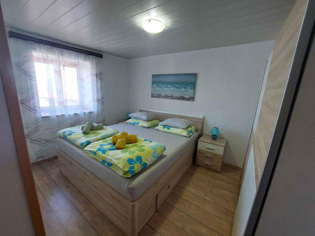 Postel nebo postele na pokoji v ubytování Apartments in Klanice/Insel Krk 14692