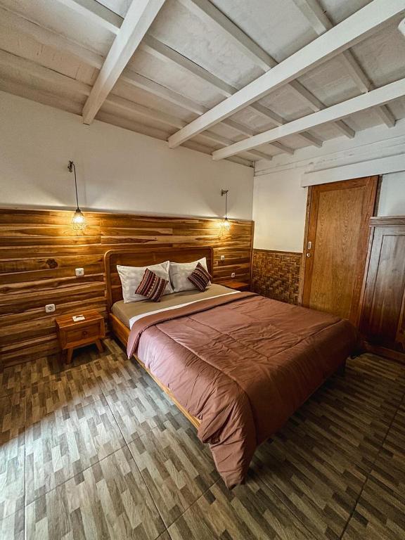 Una cama o camas en una habitación de Sedjiwa