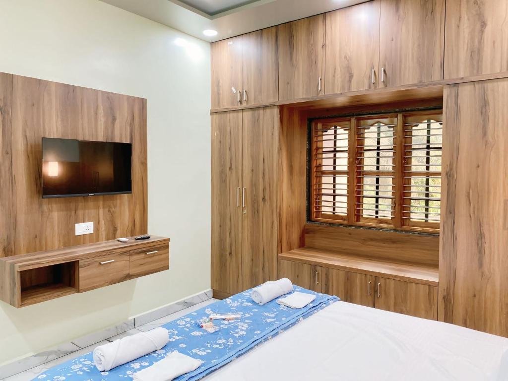 TV a/nebo společenská místnost v ubytování Arcadia Homestay