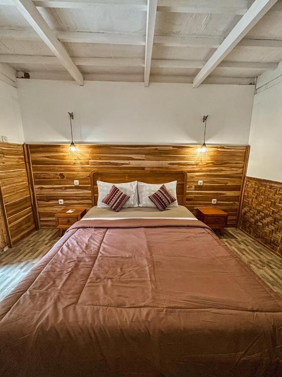 Una cama o camas en una habitación de Sedjiwa
