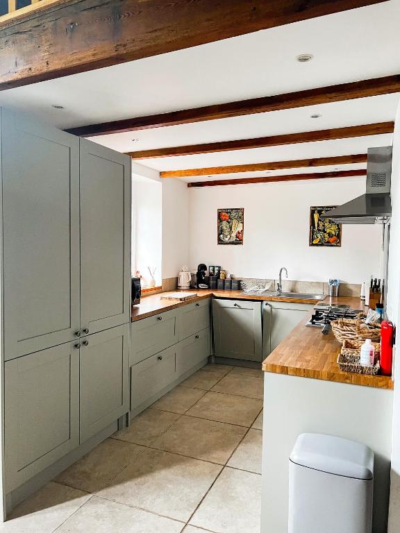 Kuchyň nebo kuchyňský kout v ubytování La Maison Gavraise