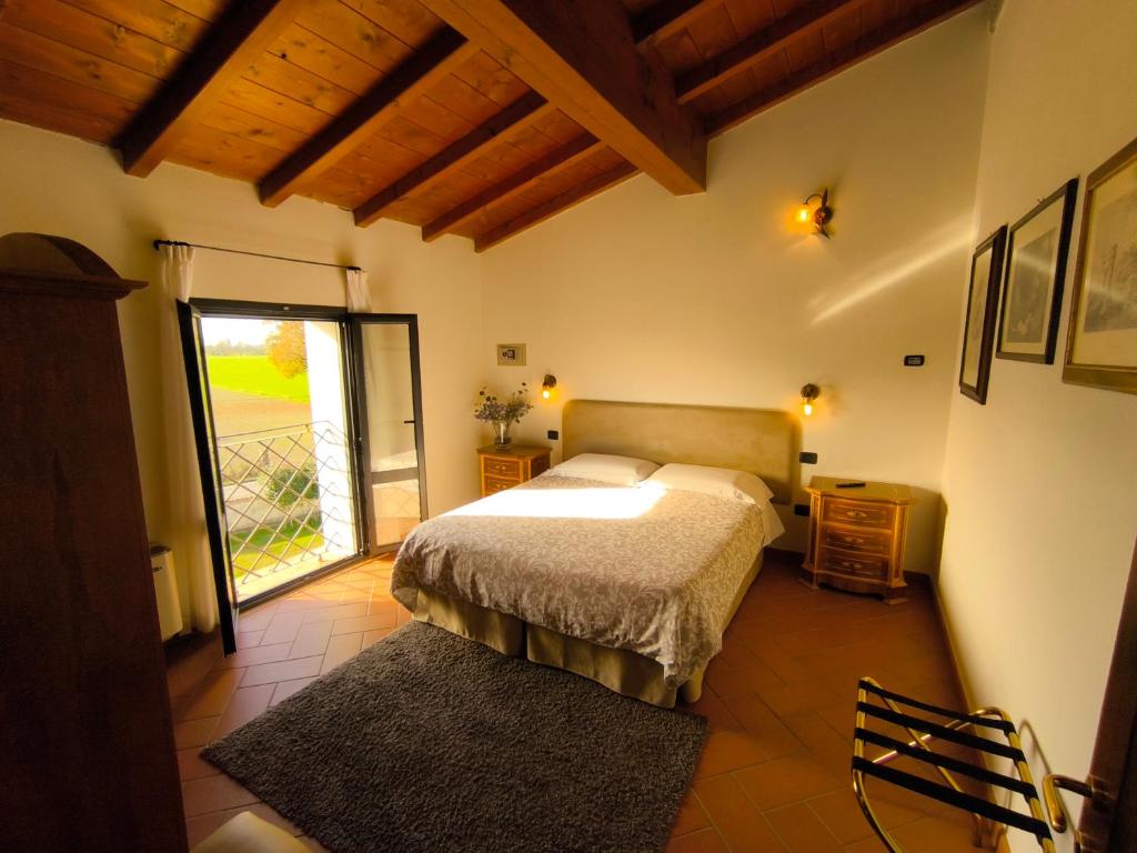 Letto o letti in una camera di Volivia Relais
